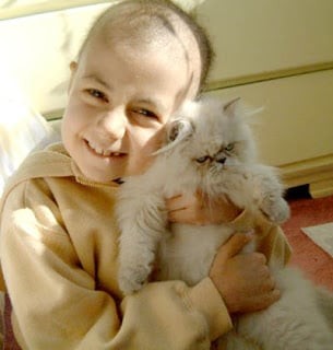 Alex và mèo con Herbert năm 2003